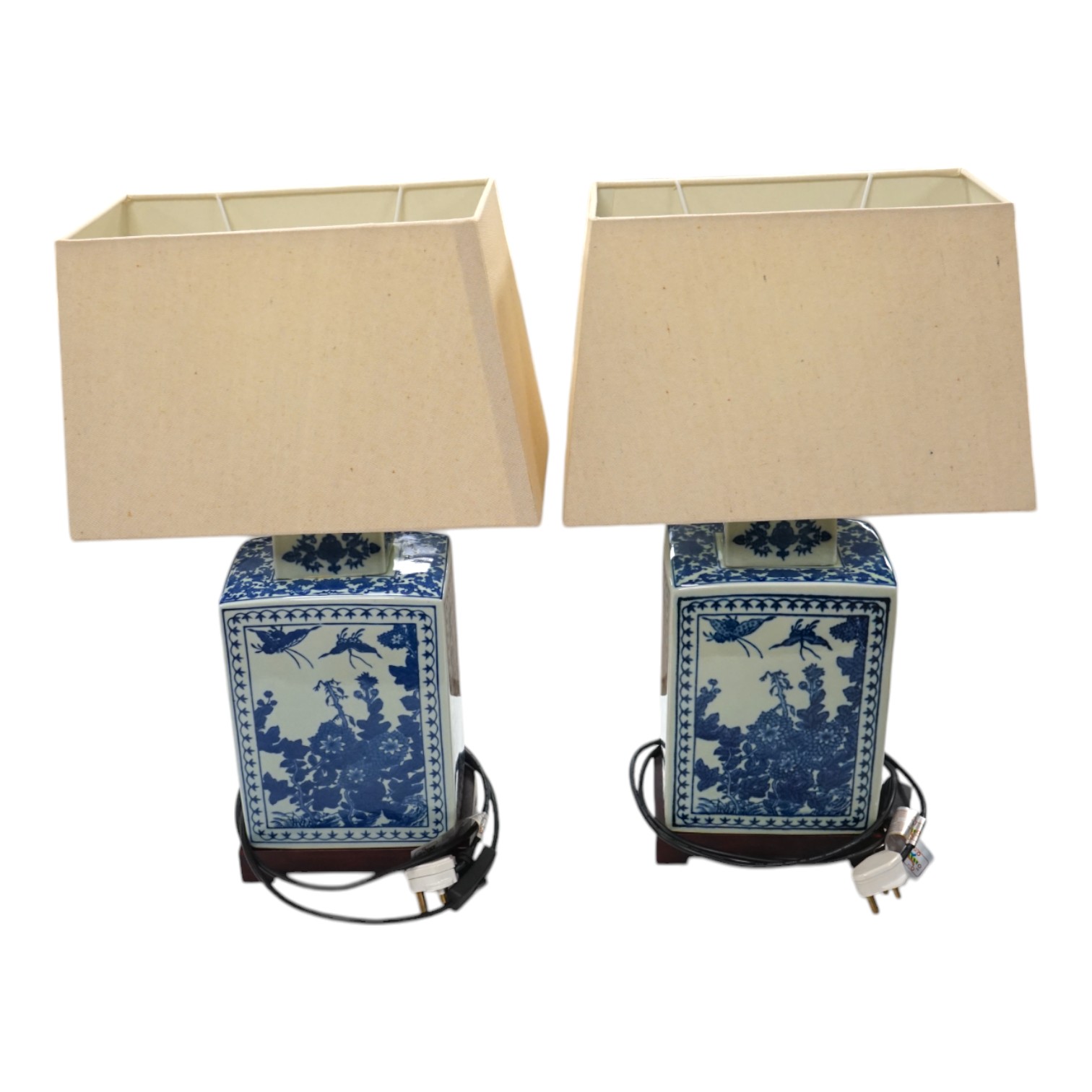 A pair of rectangular profile Japanese blue and white table lamps on stands, with shades, 59cm high. Condition - good